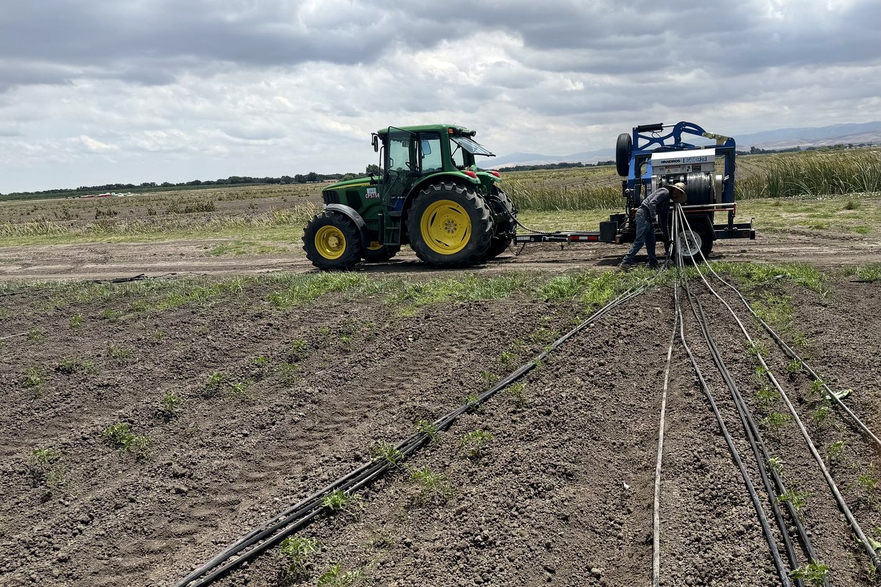 Agricultural plastic retrieval equipment operating in Stockton California